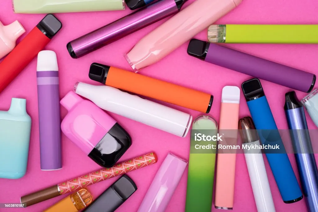 vape device on pink background