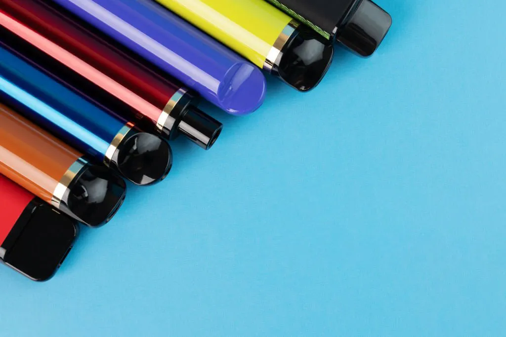 vape device on blue background